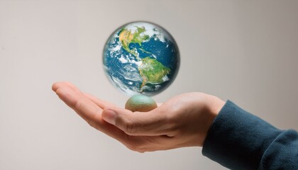 거대한 손 위에 떠 있는 작은 지구