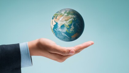 거대한 손 위에 떠 있는 작은 지구