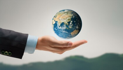 거대한 손 위에 떠 있는 작은 지구