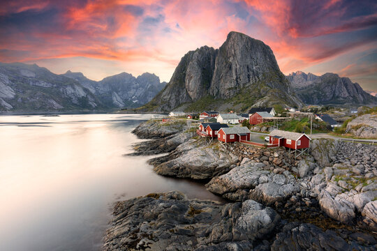 Beautiful sunrise over Hamnoy, fishermen village with the typical red houses of the Lofoten Islands, Norway