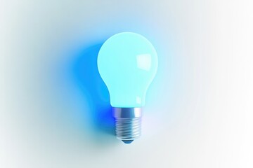 A glowing light bulb, emitting a soft blue light, symbolizes ideas, innovation, and solutions.