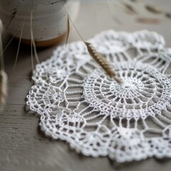 Obraz premium Elegant white lace doily showcasing traditional craftsmanship and beauty