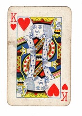 A well used, grubby hearts playing card.