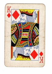 A well used and grubby diamonds playing card on a white background.