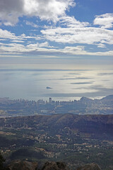 The panorama opening from the pick Puig Camapan in the direction of Benidorm and sea, Spain 