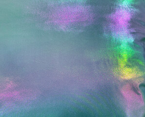 Unique holographic shiny satin fabric that reflects various color spectrum of rainbow colors. RGB...