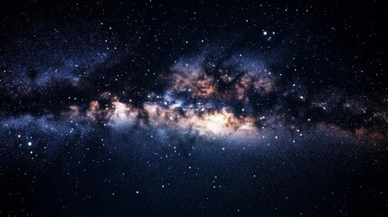 Fototapeta premium A starry night sky with a large cloud of dust and gas. The stars are scattered throughout the sky, with some closer together and others further apart