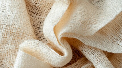 Fototapeta premium A detailed close-up of a white cloth showcasing an intricate knot, emphasizing texture and craftsmanship in fabric design.