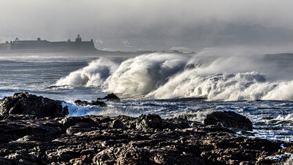 waves crashing on rocks