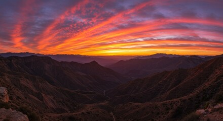 Fototapeta premium Spectacular sunset paints Mandeville Canyon with fiery hues and dramatic shadows