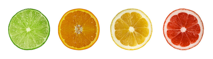Citrus fruit slices isolated, top view. Grapefruit, orange, lime and lemon