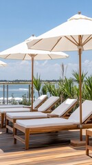 Beachfront lounge chairs, ocean view, relaxation