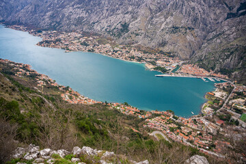 Obraz premium Panoramic view of Kotor town and Bay Boca from mountain view point in Montenegro in winter time