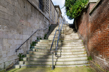 ROUEN, NORMANDY, FRANCE - 2025: Faucon street, small pedestrian street with big stairs, next to Museum of Antiquities