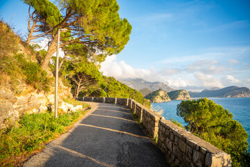Pedestrian path to tunnel through a rock or mountain near Petrovac town in winter time, Montenegro. 