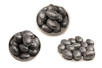 Chocolate silver eggs isolated on a white background.