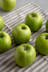 Organic Green Granny Smith Apples, side view.