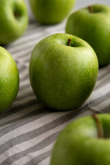 Organic Green Granny Smith Apples, low angle view. Close-up.
