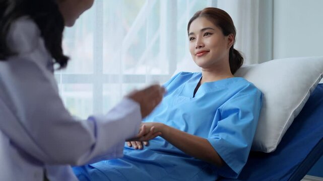 Caring nurse gently supporting patient, offering comfort and empathy during medical procedure in hospital environment