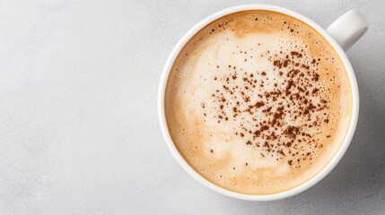 Cappuccino coffee cup, overhead view, grey background, breakfast