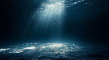 Fototapeta premium Rays of light in dark water depth