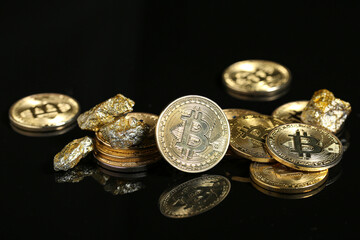 Gold with bitcoins on dark background