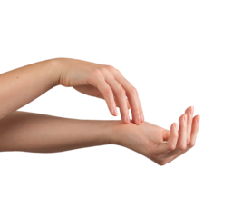 Female hands applying moisturizer with a gentle touch, showcasing healthy, well-groomed nails and smooth skin. Symbolizing beauty, self-care, and wellness. Isolated on white background.