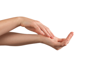 Female hands gently applying moisturizer, with a focus on healthy, well-groomed nails and smooth skin. Symbolizing self-care, beauty, and wellness. Isolated on white background.