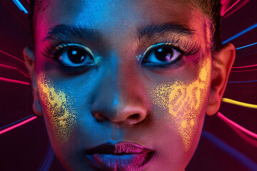 Cyber Glow Portrait &ndash; Futuristic Woman with Neon Face Paint, Immersive Digital Aesthetics, and Vibrant Light Trails
