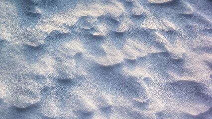 Abstract volumetric pattern on snow on ice in winter