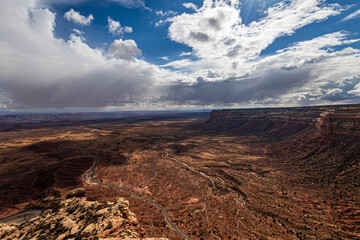 The Moki Dugway on Utah Highway 261 is a steep section of switchbacks going down a Cedar Mesa with beautiful views of valley below.