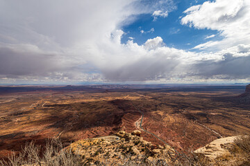 The Moki Dugway on Utah Highway 261 is a steep section of switchbacks going down a Cedar Mesa with beautiful views of valley below.
