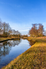 River Landscape with Blue Sky and Trees