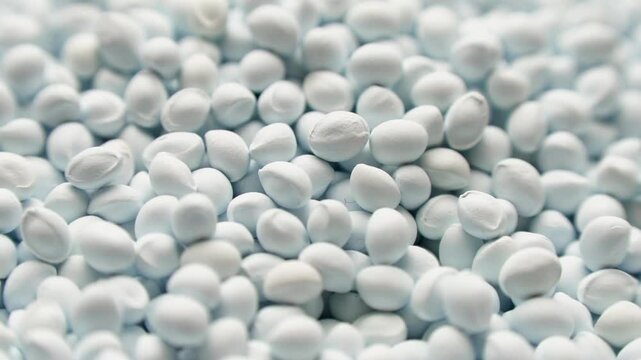 White polymer dye in granules, background texture