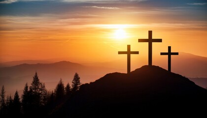 Three crosses stand on hill. Sunrise over the mountains. Religious symbol. Christian concept. Good friday. Easter sunday. Light in the sky.