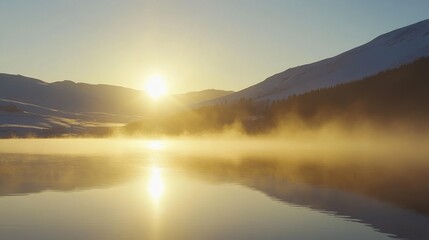 Winter Sunrise Over Mountain Lake with Golden Mist and Snow Covered Peaks