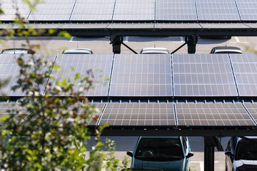 Parking space with solar panels on a roof. Solar canopy