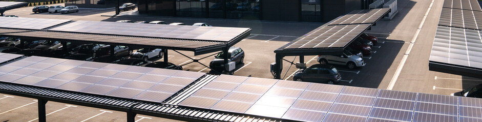 Parking space with solar panels on a roof. Solar canopy