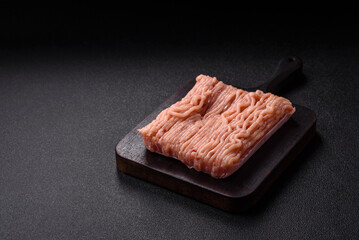 Raw minced chicken with salt, spices and herbs