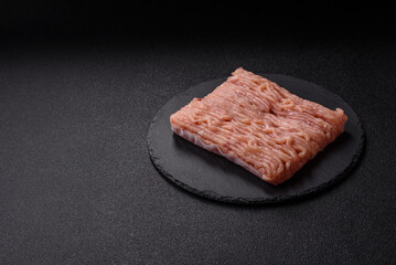 Raw minced chicken with salt, spices and herbs