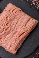 Raw minced chicken with salt, spices and herbs