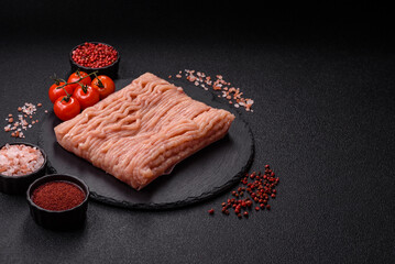 Raw minced chicken with salt, spices and herbs