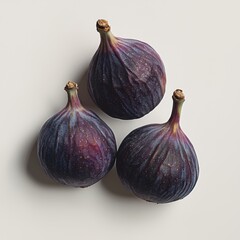 Obraz premium Ripe figs with a deep purple skin and soft red interior isolated on white