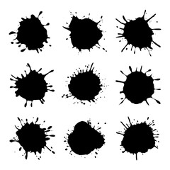 A set of black ink splashes with high contrast, ideal for artistic backgrounds, digital media, and creative design projects.