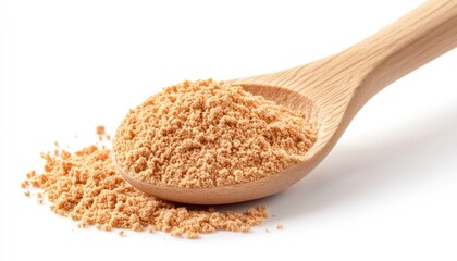 Brown Sugar in Wooden Spoon Close-up on White Background