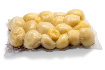 potatoes cooked vacuum-sealed in plastic tray for sous vide cooking, isolated on white with clipping path included
