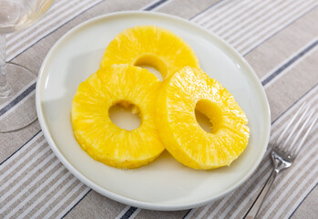Beautifully sliced pineapple on white plate, beautiful serving pineapple on festive table
