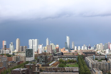 Obraz premium Vibrant Daytime Views of Rotterdam – Bustling Cityscape and Modern Architecture