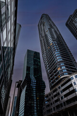 Fototapeta premium Night view from below skyscrapers of Frankfurt am Main