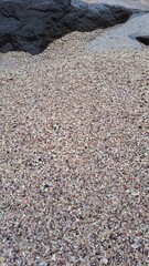 A areia grossa na praia das Conchas, em Ubatuba, litoral norte paulista, Brasil.